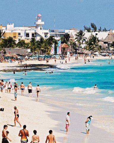 Playa del Carmen beach with turquoise water and palm-lined shore